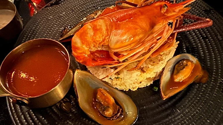 Ravioli Lobster Tomyum is the best dishes in The Arth